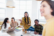 © Sam Edwards/Caia Image - Businesswomen talking in conference room meeting