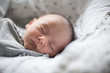 © Sam Edwards/Caia Image - Close up tired newborn baby boy sleeping
