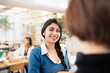 © Sam Edwards/Caia Image - Smiling businesswomen talking in office