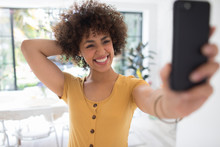 Happy Confident Young Woman Taking Selfie With Smart Phone