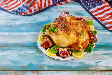 July of 4th party roasted chicken with american flag.