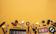 Make up cosmetics products against orange color background