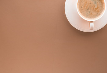 Cup of hot coffee as breakfast drink, flatlay cups on beige background