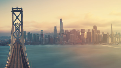 Wonderful view from the height of Oakland Bridge in San Francisco at sunset