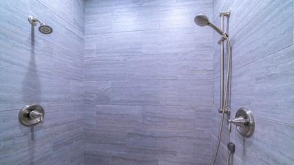 Wall Mural - Panorama Tiled shower cubicle with dual heads bright interior