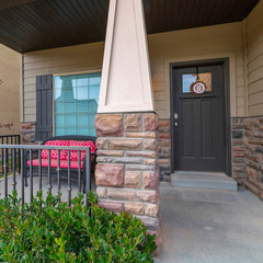 Wall Mural - Square Entrance porch with colorful red settee day light