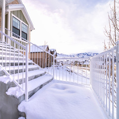 Wall Mural - Square Cement steps covered in thick fresh winter snow