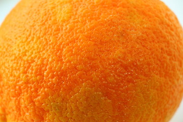 Orange peel. Vitamins Citrus. The fruit. Orange background Natural product. Pores. Cellulitis Obesity.