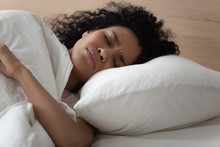 African Woman Lying In Bed Has Nightmares Sleeps Bad