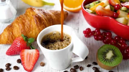 Wall Mural - healthy breakfast with coffee cup, fruit and croissant