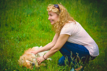 Mature woman on a nature, relax time with a dog