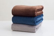 Stack Of Folded Soft Blankets Isolated