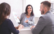 © Prostock-studio - Cheerful expert explaining investment plan to new clients