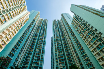 Wall Mural - looking up on high-rise apartment building, residential building facade, hongkong