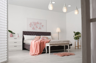 Sticker - Stylish room interior with large comfortable bed