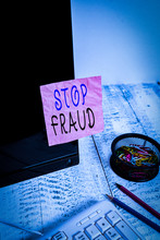 Handwriting Text Writing Stop Fraud. Conceptual Photo Campaign Advices Showing To Watch Out Thier Money Transactions Note Paper Taped To Black Computer Screen Near Keyboard And Stationary