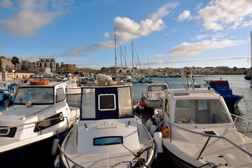 Wall Mural - boats and fishing boats in the harbor Favignana Sicily Italy