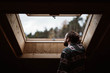 © Alex Domarco/ADDICTIVE STOCK - From below back view of bearded male tourist in casual shirt looking in wooden skylight delighting in nature on blurred background at Dolomites Mountains, Italy