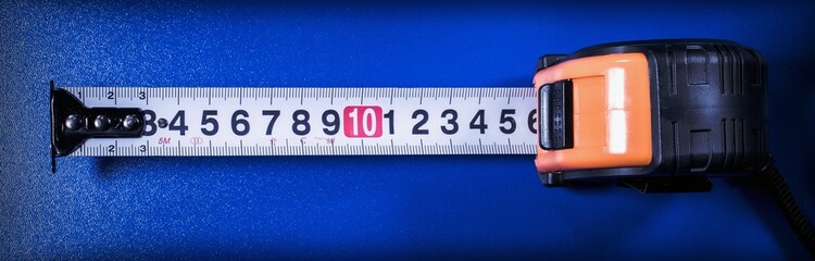 tape measure on a blue background