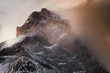 © Erick Strange/ADDICTIVE STOCK - Great stony rock covered by snow in mysterious haze in Torres del Paine National Park