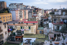 Napoli, Italy - November 23, 2019: From Above Of Old Colorful Buildings With Blue Sky On Background 