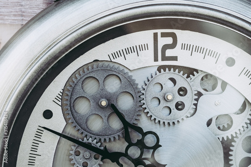 Cuadros en Lienzo Mécanisme métal engrenages à l'intérieur d'une montre
