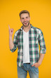 © be free - great idea. inspired student yellow background. Make You Look Good. casual fashion for men. Masculine Outfits And Look. stylish male in fashionable clothing. handsome man in checkered shirt and jeans