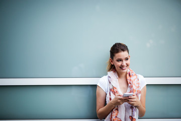 Wall Mural - Portrait of beautiful young happy woman smiling