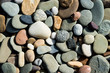 canvas print picture - Color rendering of smooth and flat river rocks great for background, featuring contrasting values, textures, and shapes