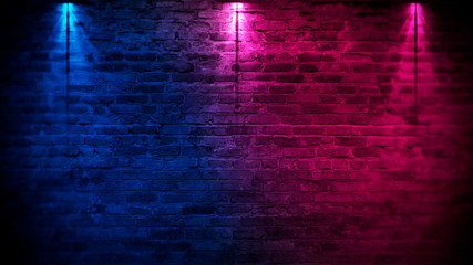 Wall Mural - Old brick wall with neon lights. Neon shapes on brick wall background. Dark empty room with brick walls.