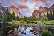 Vanilla Sky Sunset on Yosemite Valley reflecting in the calm water of Merced River, Yosemite National Park, California, USA.