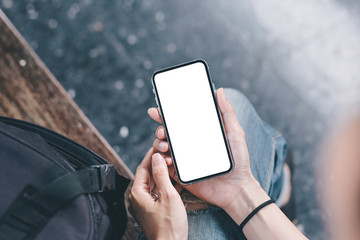 Mockup image blank white screen cell phone.man hand holding texting using mobile.background empty space for advertise text.people contact marketing business,technology 