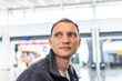 © Kristina Blokhin - Closeup portrait of young man face looking sitting in airport terminal gate waiting for airplane with blurry background