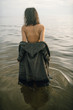 © Nikita - Woman portrait on sea in water