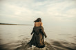 © Nikita - Woman portrait on sea in water
