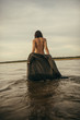 © Nikita - Woman portrait on sea in water