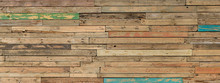 Wooden Background From Many Old Painted Boards In Different Colors. Panoramic Wide Multicolored Rough Texture. Woodern Banner.
