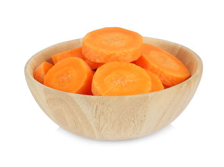 Wall Mural - Peeled carrots, sliced into pieces in a wooden bowl isolated on white background.