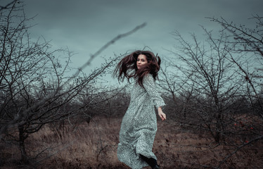 young woman in the forest