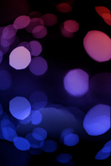 Wall Mural - bokeh of lights purple and pink on colorful background.