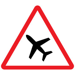 Wall Mural - Airport warning sign or low flying airplane, red triangle background. Caution symbol.