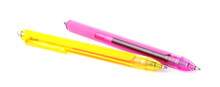 Pink And Yellow Retractable Pens Isolated On White
