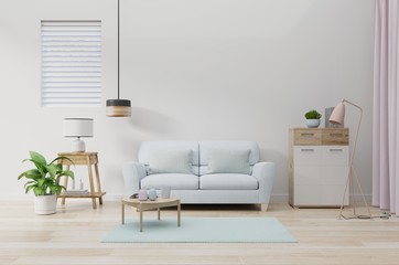 Modern living room interior with sofa and green plants,lamp,table on white wall background.