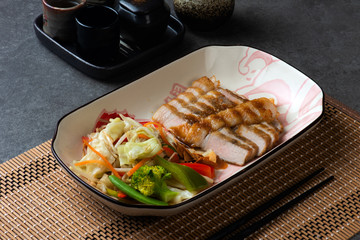 Poster - pork cutlet served with shredded cabbage