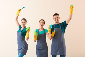 Canvas Print - Portrait of janitors on light background