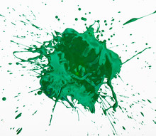 Artistic Image Of Green Paint Spot Spilled On Background Of White Paper