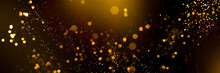 Golden Abstract Bokeh On Black Background. Holiday Concept