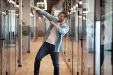 Funny Happy Male Employee Dance In Office Celebrating