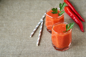 Wall Mural - Two glasses of tomato smoothie with parsley