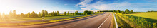 Asphalt Road Panorama In Countryside On Sunny Summer Day